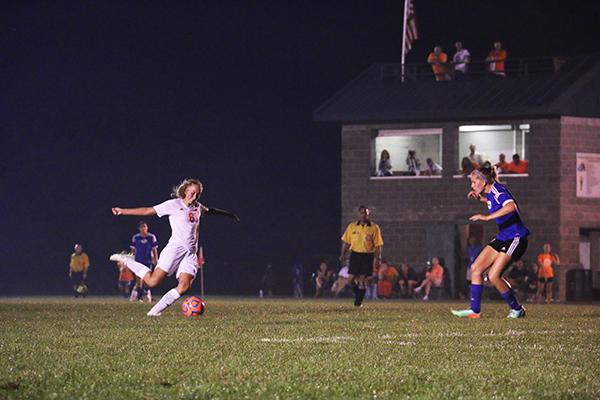 Junior Karlee Dowd makes a long pass during the North/East game. 