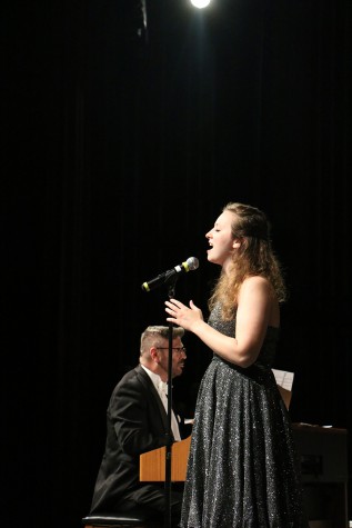 Senior Sarah Harpring, a member of Center Stage, performs during Monday nights concert.