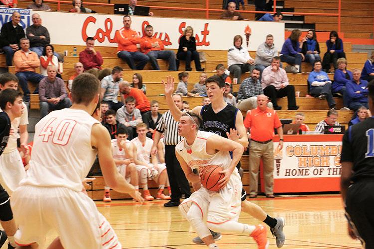 Senior guard Parker Chitty drives through the lane during a home game.