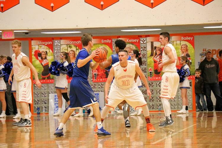 Senior Parker Chitty playing defense against a Columbus North player.