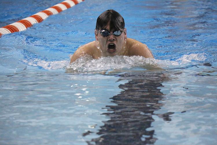 Senior Oscar Richter competes in the breaststroke leg of the 200 yard Individual Medley. 