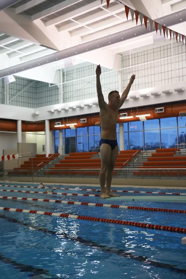 Senior diver Cordell Glass prepares to dive during a practice earlier this season.