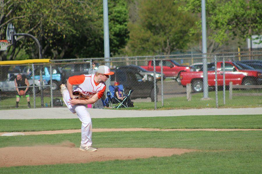 Freshman Julian Greenwell pitches against the Jennings County Panthers on April 29th.