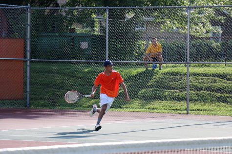 Senior Neeraj Pandita hits the ball against North.