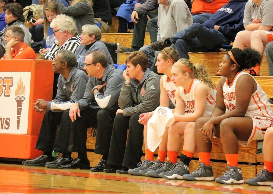 The Columbus East Girls Basketball team on the bench