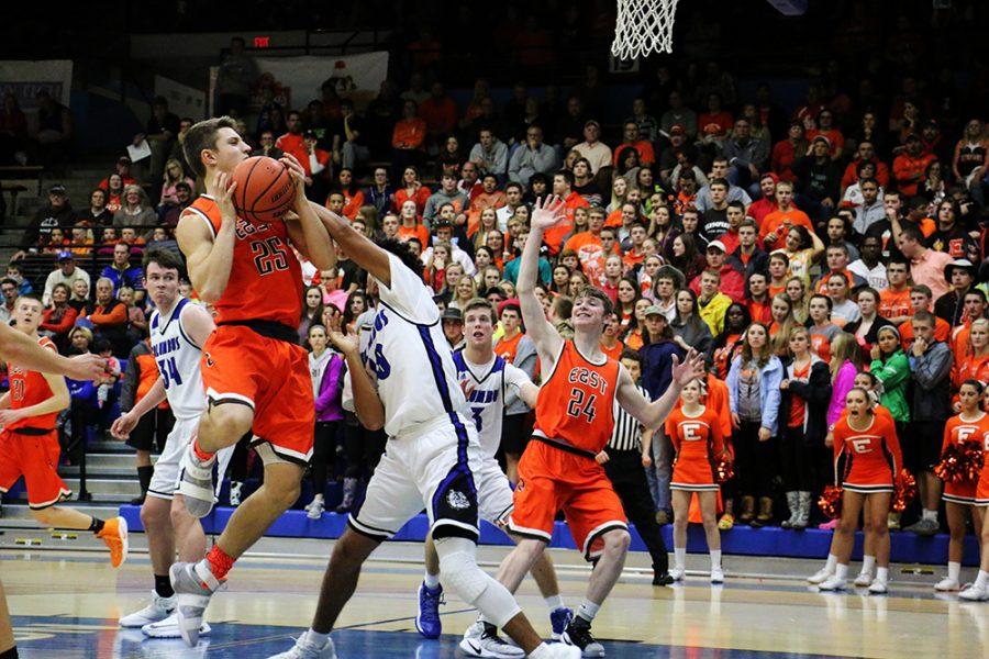 Senior Tanner McFall drives to the hoop.