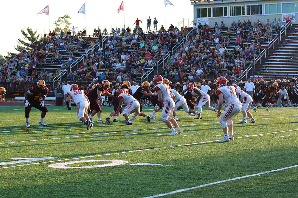 Easts defense tries to stop the Cougars.