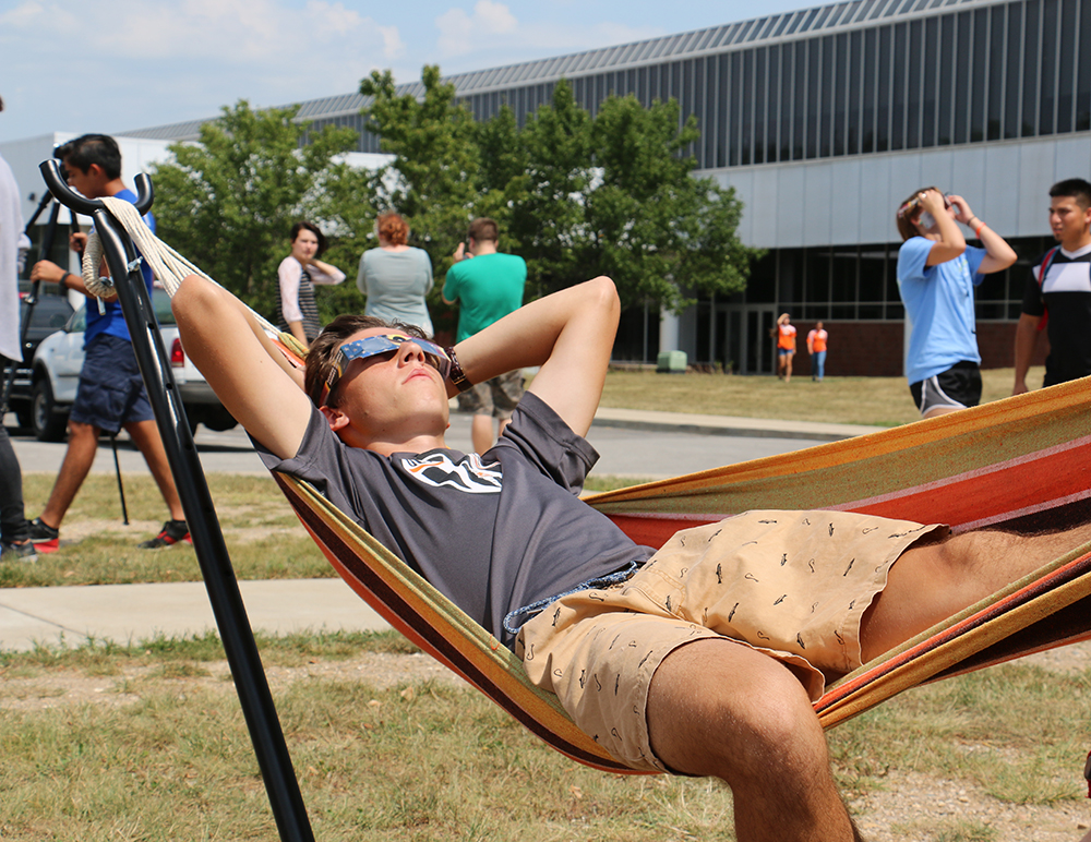 Dustin Rodgers views the eclipse from his hammock.