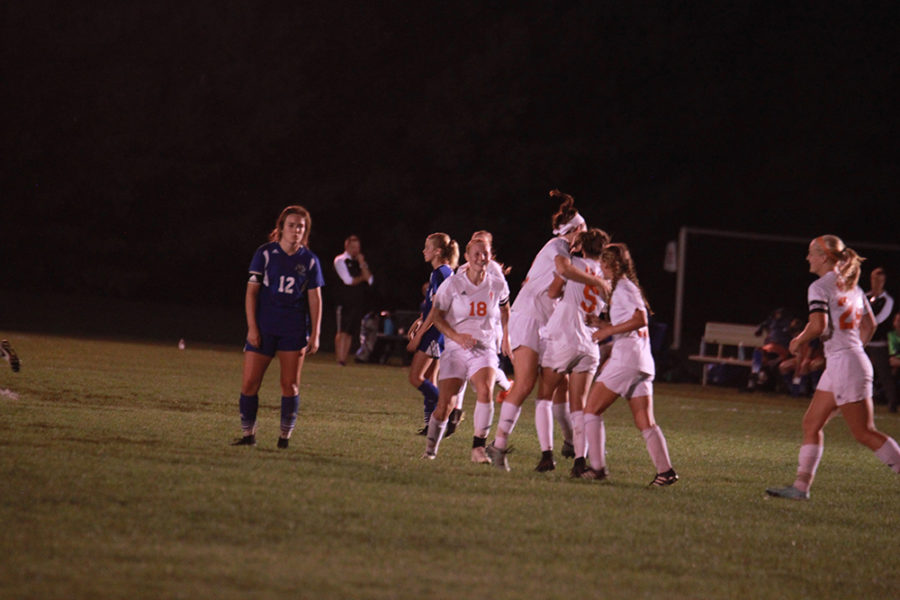 The Lady Os celebrate after Lindsey Stoughtons goal.