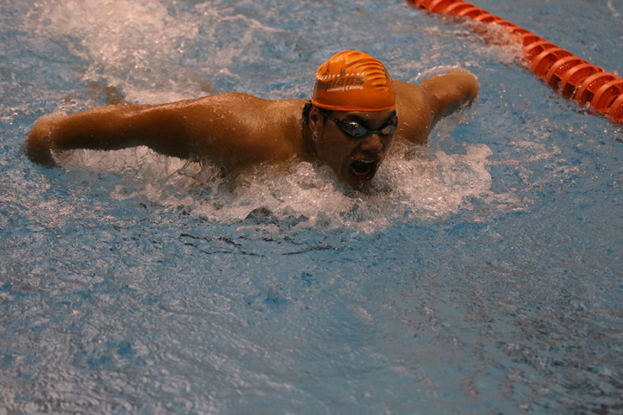 Sophomore Christian Davis swims the butterfly. 