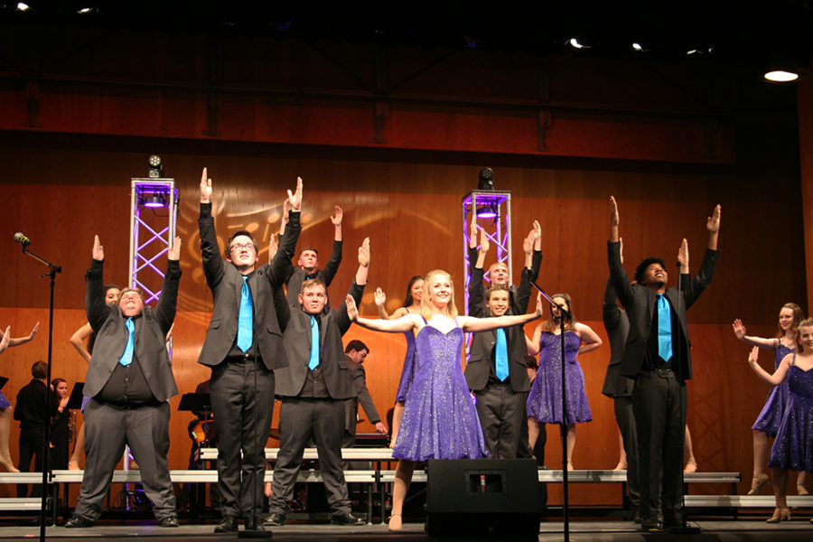 The show choir performs a song.