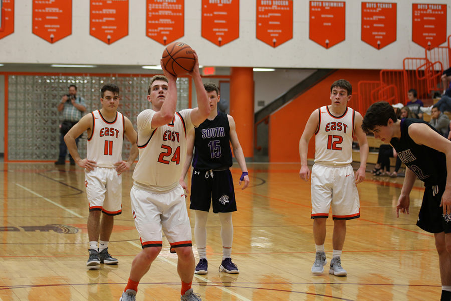 Hasson shoots a free throw.
