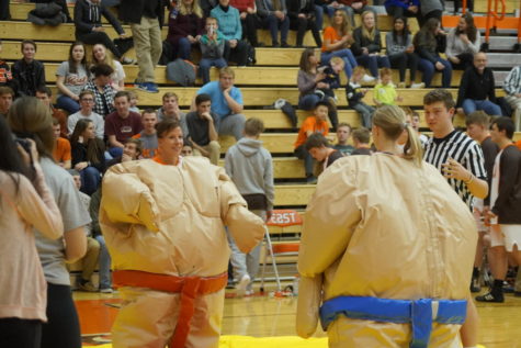 Office Q and Mrs.Baugh get ready to start the match.