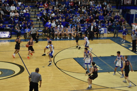 Sophomore Tyler Boyer gets the hand off.