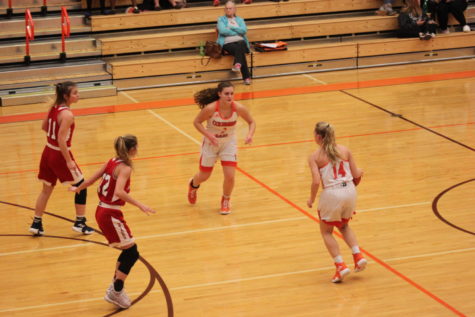 Junior Whitley Rankin dribbles towards a teammate.
