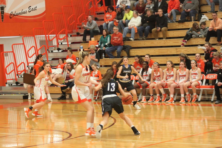 Junior Kaitlin Dougherty pressures the point guard.