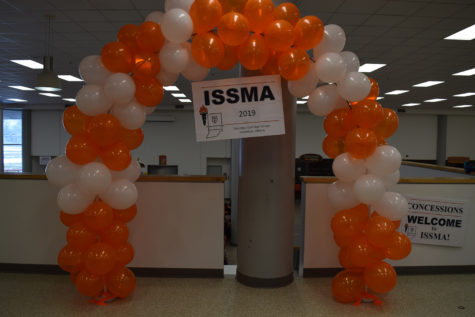 The ISSMA balloon archway provides a perfect photo opportunity for performers.