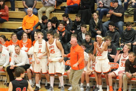 Coach Chitty celebrating with his team.