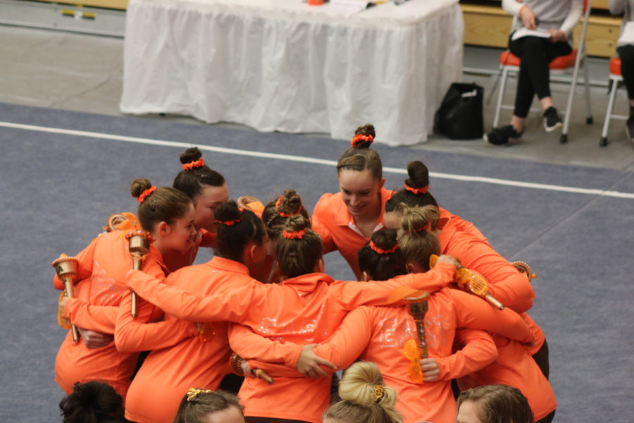 The team huddling up before the meet starts.
