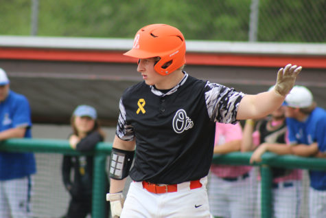 Senior Julian Greenwell puts his hand up telling them to hold.