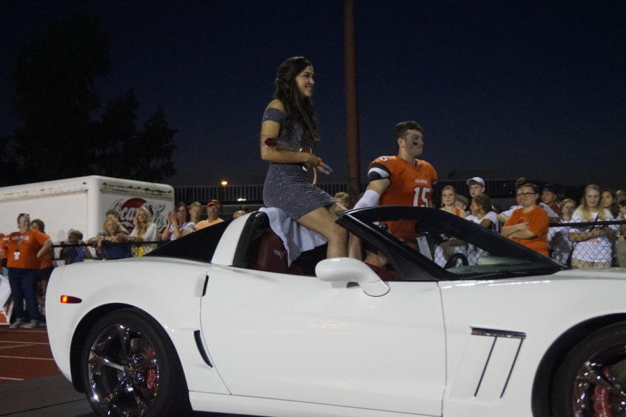 Senior Ally Mack and senior Cole Gilley arrive in a corvette.