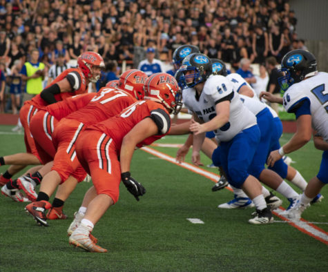 East on the defensive line, roughing the passer.