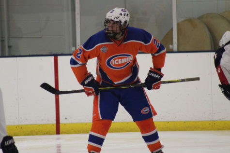 Andrew Clark stands ready to get the puck.
