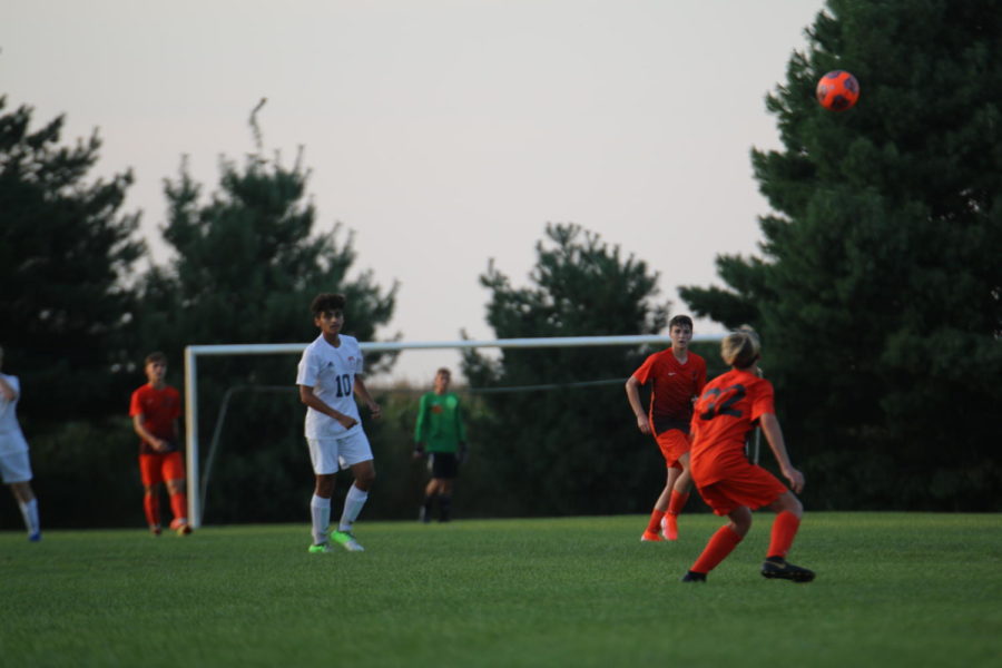 Freshman Jake Hofelich gets ready to head the ball backwards.