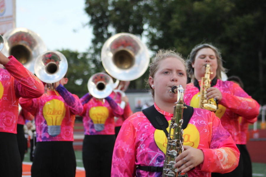 Brass instruments perform at halftime.
