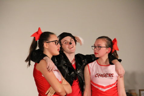 From left to right, freshman Emma Burns, sophomore Spencer Bright and sophomore Lillia Stidam engage on stage. Bright plays J'Neece's dog Ted.
