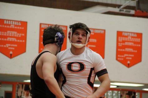Senior Noah White leaves the mat.