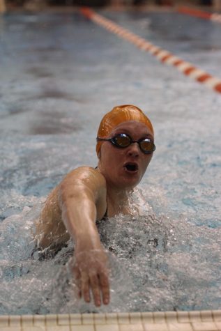 Senior Michaela Greathouse turns in the pool.
