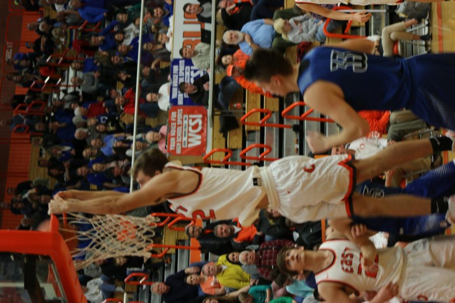 Senior Seth Chandler goes for the slam dunk.
