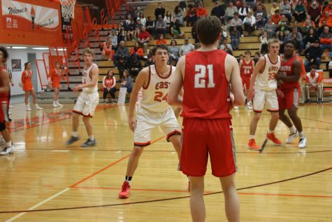 Junior Daniel Murphy guards a Fishers player.