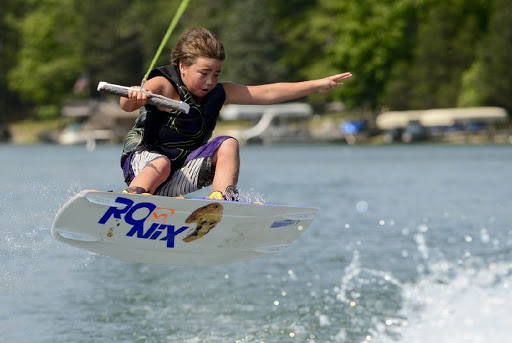 Kai Stidham, 9, takes to the air while wakeboarding Monday July 23, 2012, in preparation for the national championships in Ohio. (Joe Harpring | The Republic)  Joe Harpring | For The Republic