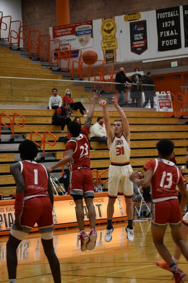 Senior Tyler Boyer drains a three. 