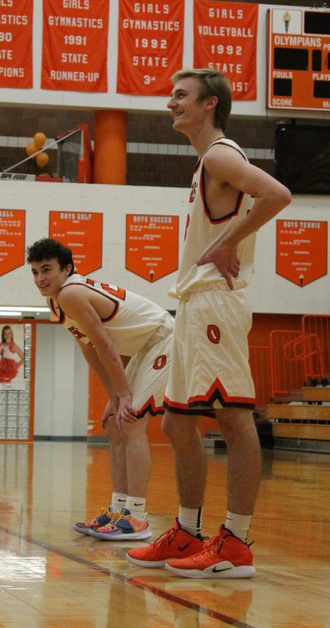 Senior Tyler Boyer and Junior Will Rieckers wait for the free throw. 