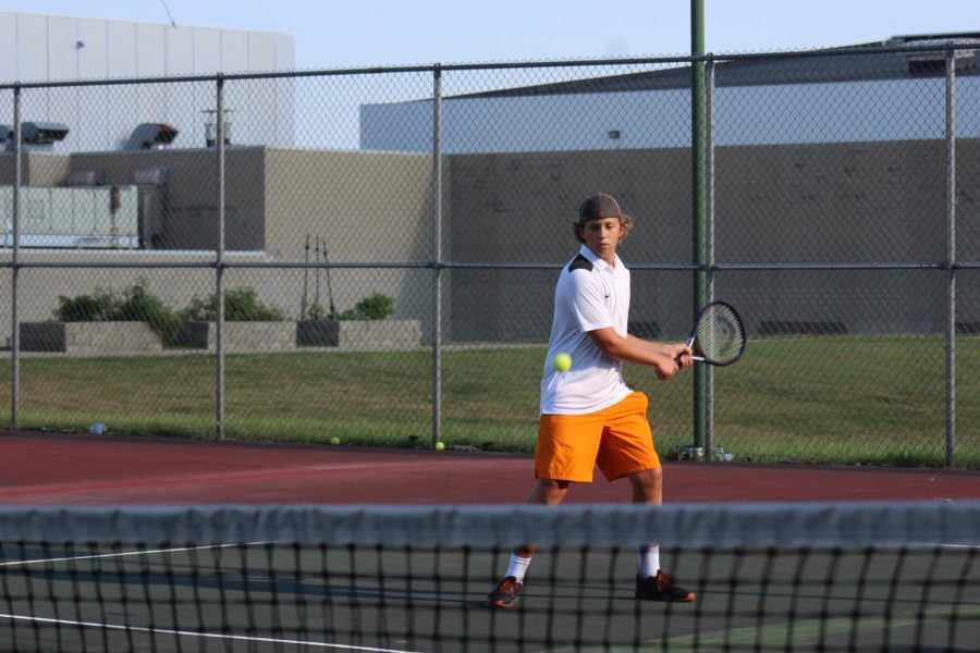 Freshman Ethan Bumbalough makes a hit.