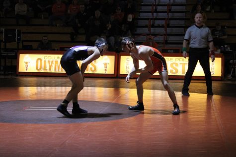 Senior Reece Fisher preparing to take down the opponent.